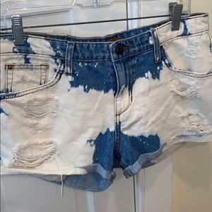 Bleached cuffed denim shorts with distressing
